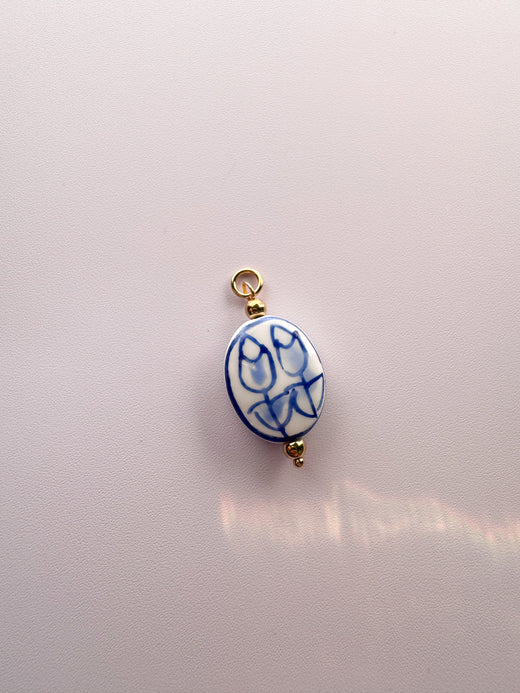 Oval Blue and White Charm