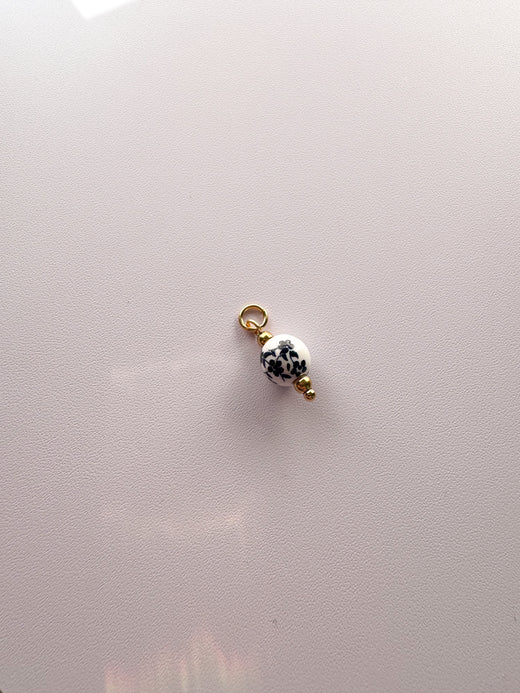 White and blue Charm